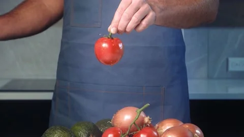 Cut tomato slow motion Stock Footage 170660447