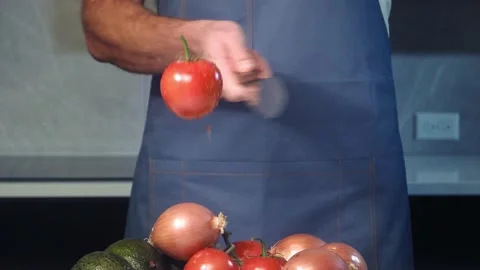 Cut tomato slow motion Stock Footage 237886595