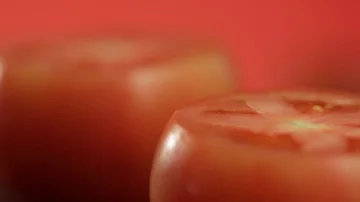 Cut Tomatoes and Focus Stock Footage