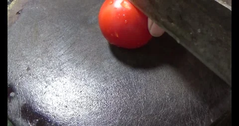 Cut tomatoes and star fruit into pieces Stock Footage 296483043