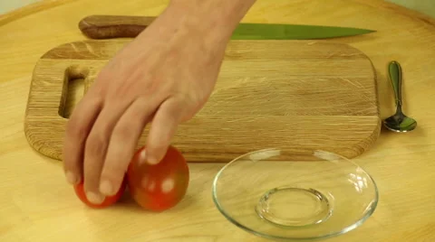 Cut tomatoes into the board Stock Footage 47981177