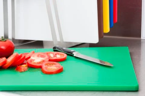 Cut tomatoes Stock Photos