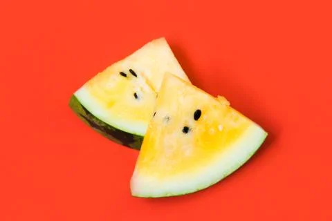 Cut off triangular slices of ripe yellow watermelon on white background 写真素材