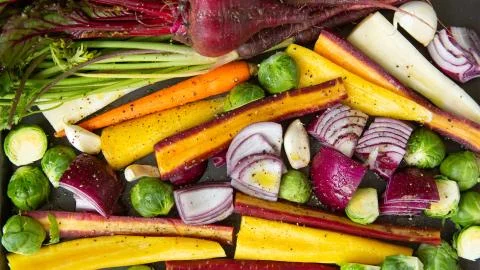 Cut Vegetables in a Roasting Pan Stock Photos