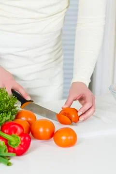 Cut vegetables to a salad Stock Photos