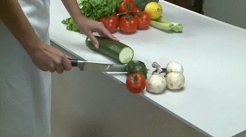 Cut vegetables on a table Stock Footage 62472660