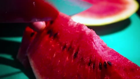 Cut watermelon into slices before serving Stock Footage 123570134