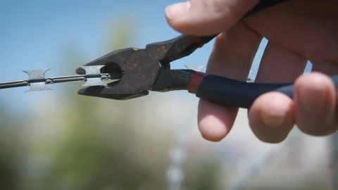 Cut a wire. Stock Footage 114035231