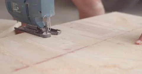 Cut wood with tools called jigsaws. Stock Footage 222621427