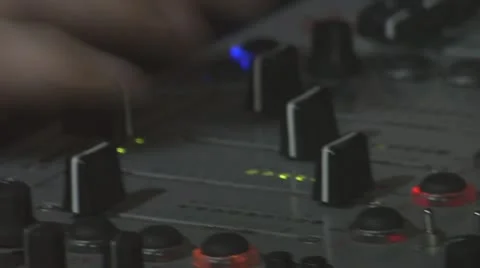 Cutaway shots of DJ hands while mixing and scratching Stock Footage 22425076