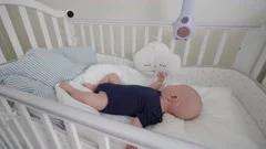 Getting 3 month old to sleep in clearance crib