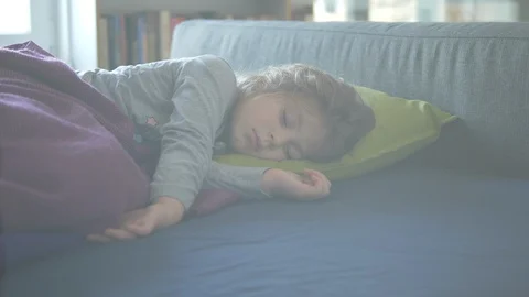 A Cute 4 Years Old Blonde Little Girl Sleeps And Dreams In Her Bed Video stock 128367391