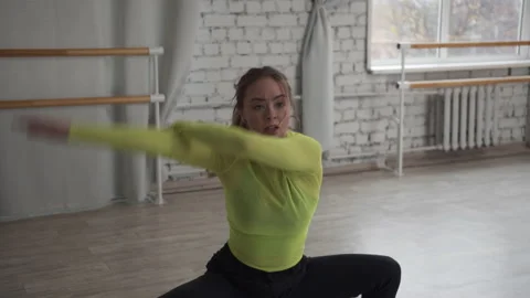 Cute actress of the dance genre performs a dance with elements of contemporary Stock Footage 143876762