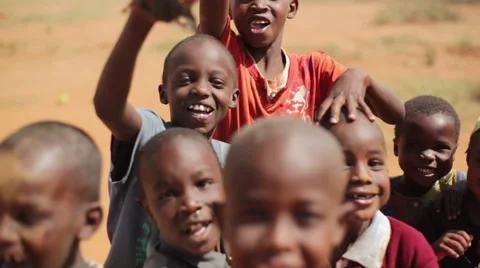 Cute African children smile and play, Samburu, Kenya, Africa Stock Footage