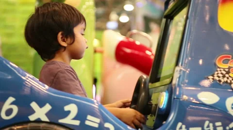 Cute Asian Boy Having Fun On Ride At Carnival 스톡 동영상 29878684