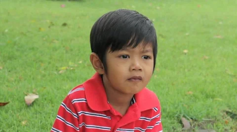 Cute Asian Boy At The Park 스톡 동영상 10865608