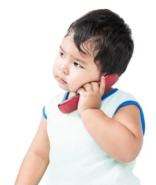 Cute asian boy using mobile phone Stock Photos