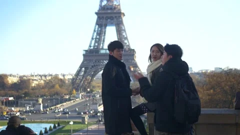 Cute Asian Couple At The Eiffel Tower In Paris, France Stock Footage 158609339