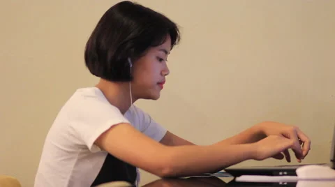 Cute Asian teen using smart phone with handheld camera 库存影片 63757022