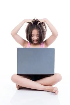 Cute asian using laptop computer and confused Stock Photos