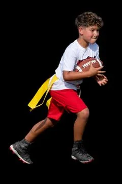 Cute athletic boy playing flag football Stock Photos