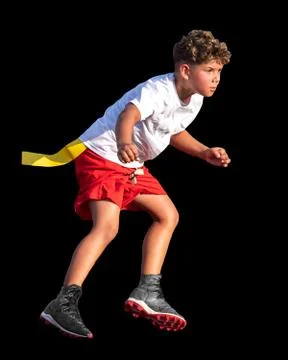 Cute athletic boy playing flag football Stock Photos