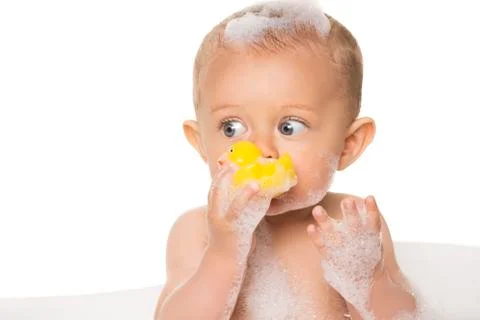 Cute baby bath Stock Photos