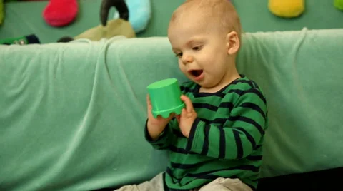 Cute baby boy having fun with blocks  Stock Footage 48975881
