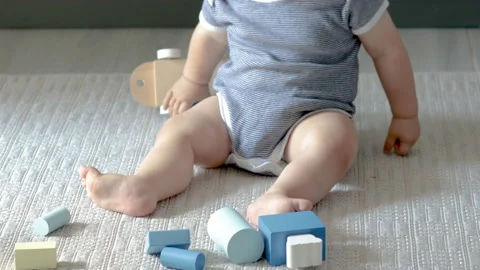 Cute baby boy playing with eco wooden toys,train Stock Footage 201525575