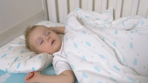 Cute baby boy is sleeping in daytime 库存影片 100139330