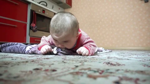 Cute baby on the floor Stock Footage 76953203