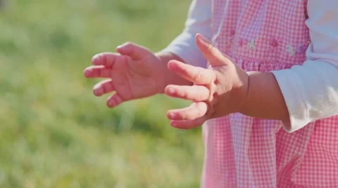 Cute baby girl is clapping hands and Stock Video Pond5
