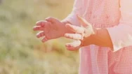Cute Baby Girl Is Clapping Hands And Having Fun Outdoors. Slow Motion 240 Fps. Stock Footage