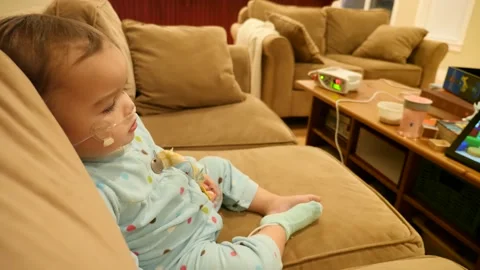 A cute baby girl is horribly sick with Stock Video Pond5