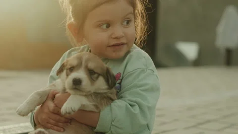 Cute baby girl smiling from pleasure, Stock Video Pond5