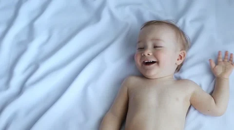 Cute Baby Laughing On White Background Stock Footage