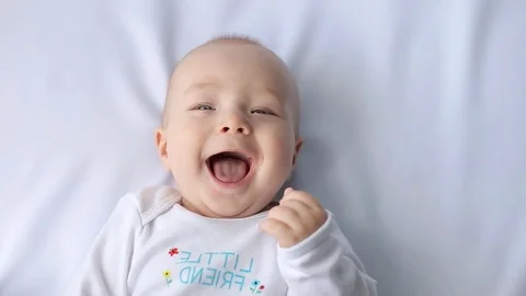 Laughing Baby White Background Stock Footage ~ Royalty Free Stock Videos |  Pond5