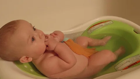 Cute Baby Playing in the Bath Stock Footage 105649342