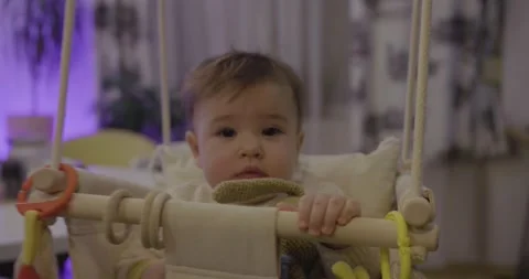 Cute baby on a swing Stock Footage 229619016