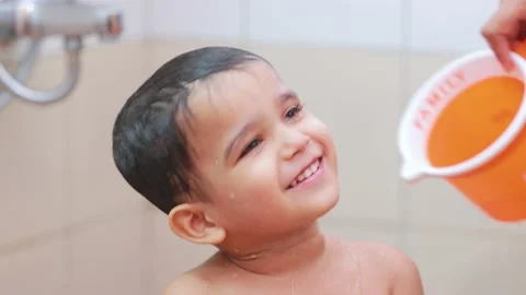 Cute Bay taking shower he is smiling closeup view Stock Footage 160547057