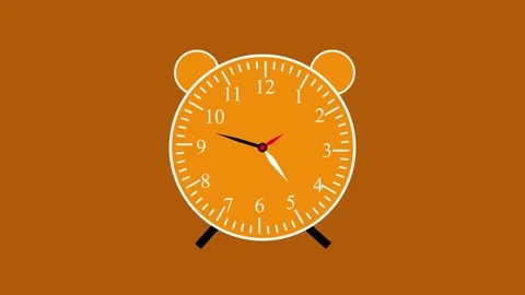 Cute bear-shaped alarm clock displaying the time of 10:10 on an orange back.. Stock Footage 337567348