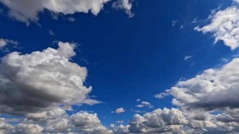 Cute big bright clouds in the blue sky bg - photo of nature Stock Photos