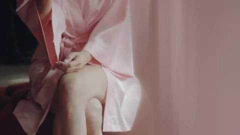 Cute blond bride making make up for her wedding near the mirror Stock Footage 85170354