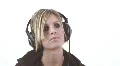 Cute blond on the headphones - 4 - lets rock! HD Footage