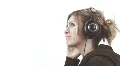 Cute blond on the headphones - 8 dolly around - happy beat HD Footage