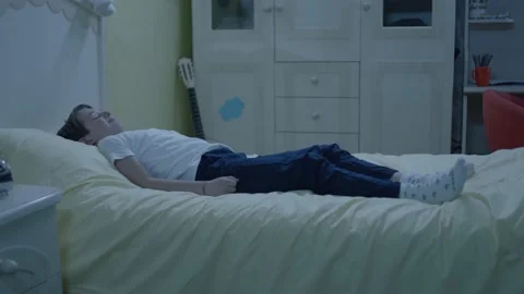 Cute blonde is resting alone on the bed in the nursery. Stock-Footage 198376364