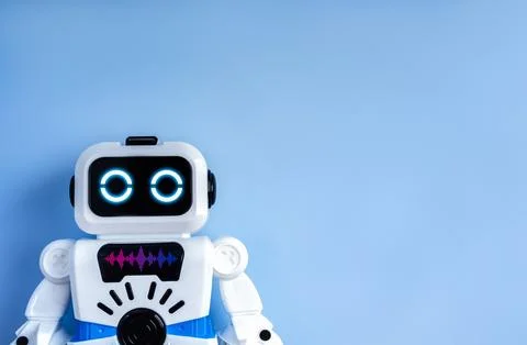 Cute boxy robot on blue background symbolizing AI assistant, chatbot, virtu.. Stock Photos