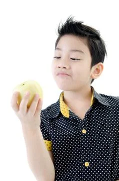 Cute boy with apple on white background Stock Photos