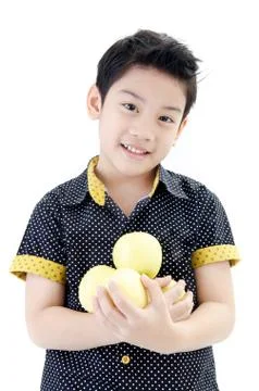Cute boy with apple on white background Stock Photos