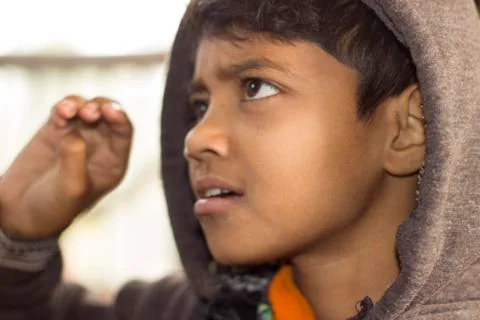 Cute boy asking question in Indian village school Stock Photos